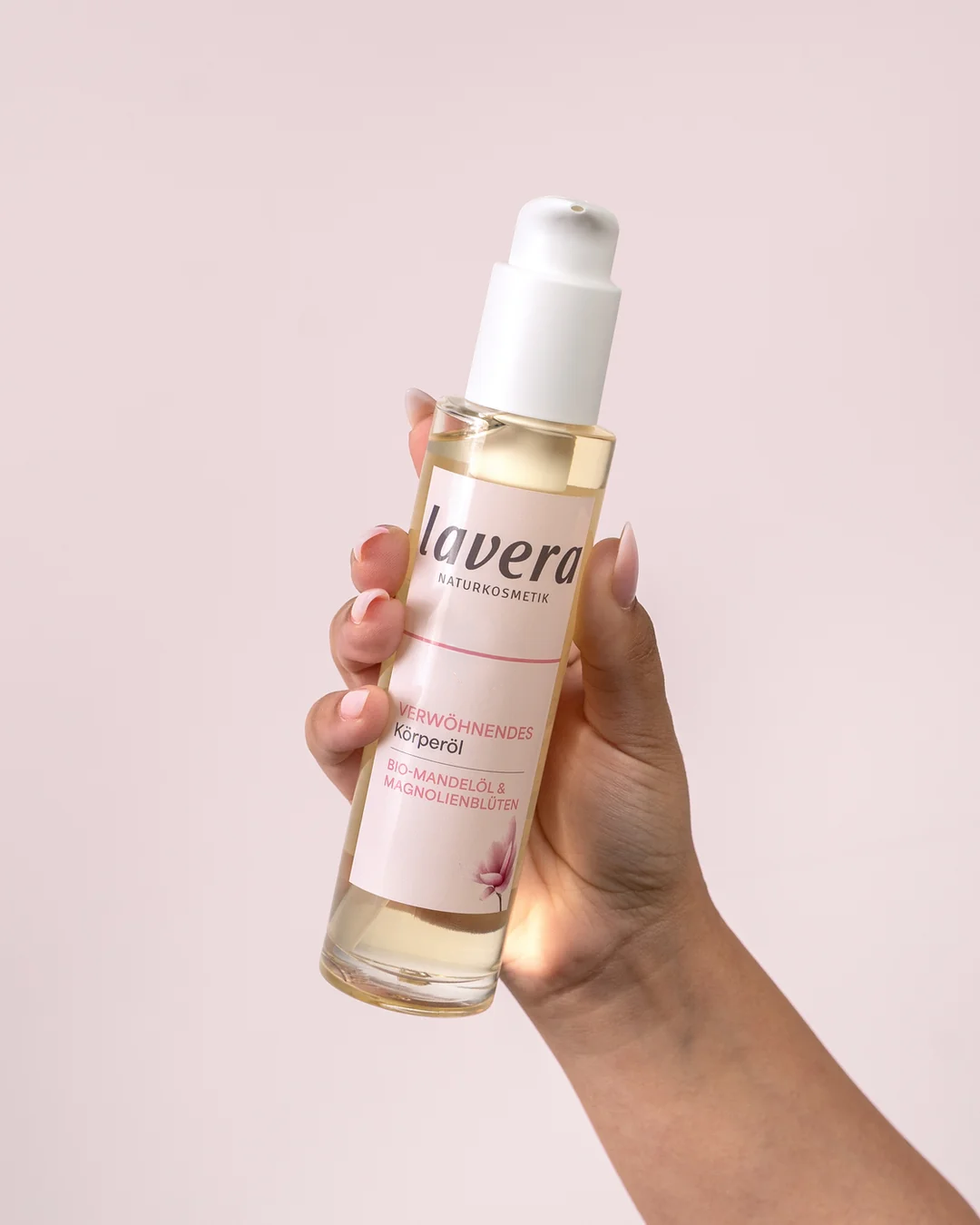 Indulgent body oil in use