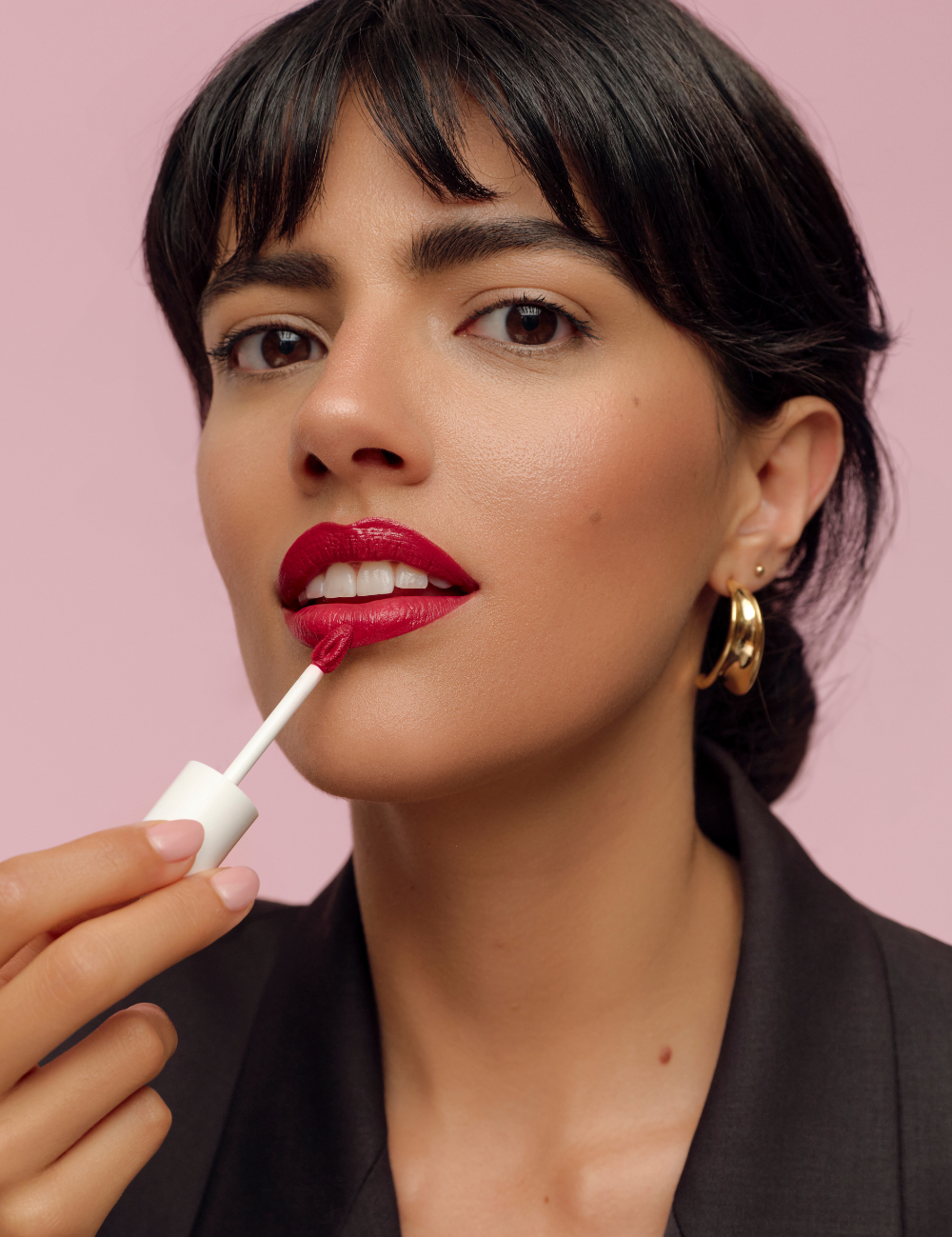lavera Pure Satin Liquid Lipstick -Poppy Red 01- during application