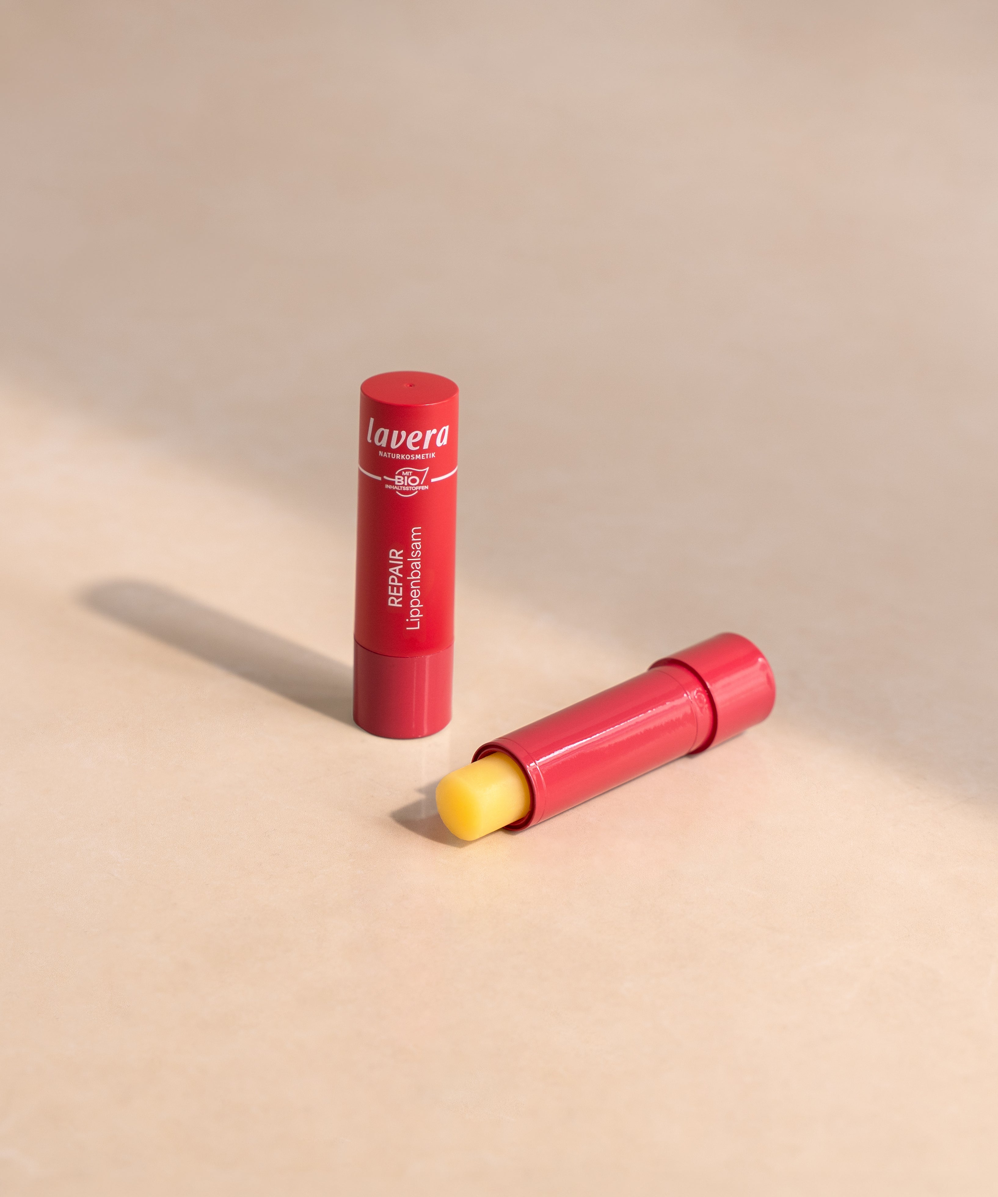lavera Repair Lip Balm during application