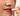 Nahaufnahme einer Frau die den Multi Balm auf den Lippen aufträgt