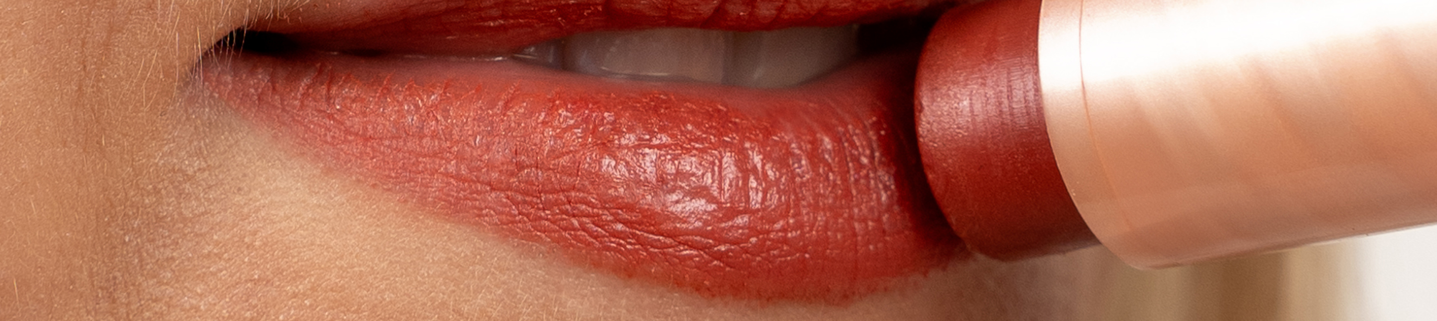 The lavera natural beauty Multi Balm is gently applied to the lips